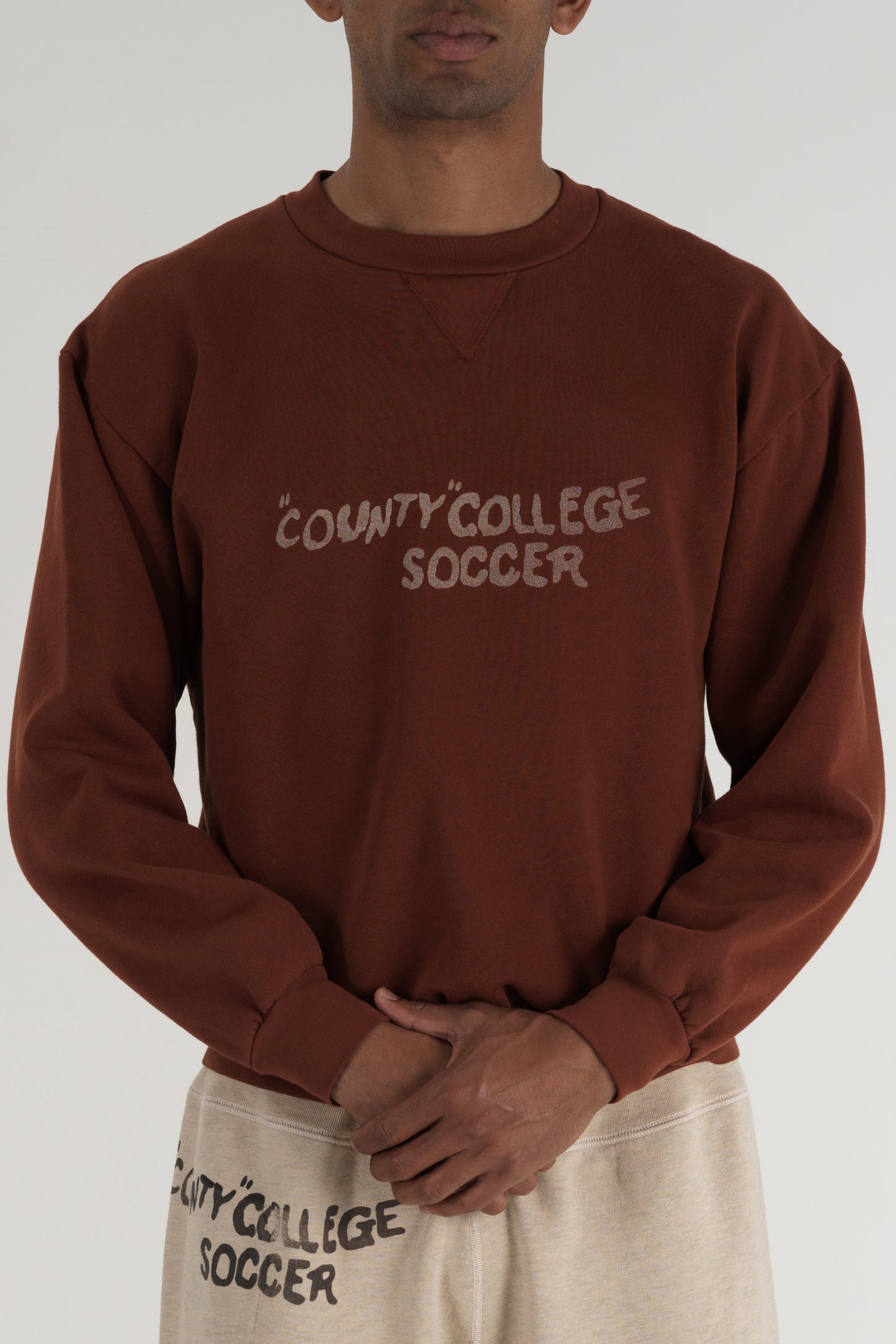 County College Soccer Crewneck Rust