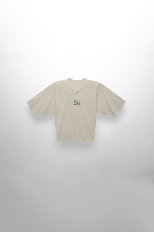 Beige t-shirt with number 56 on a white background
